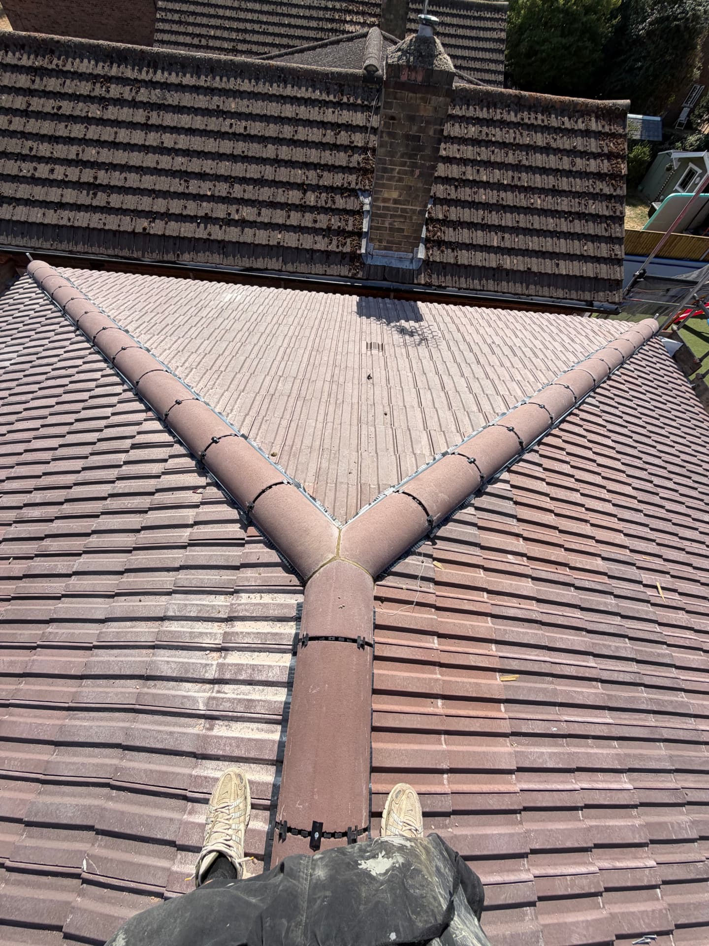 Top-down view of the ridge and hip junction with Y-tile and dry fix unions