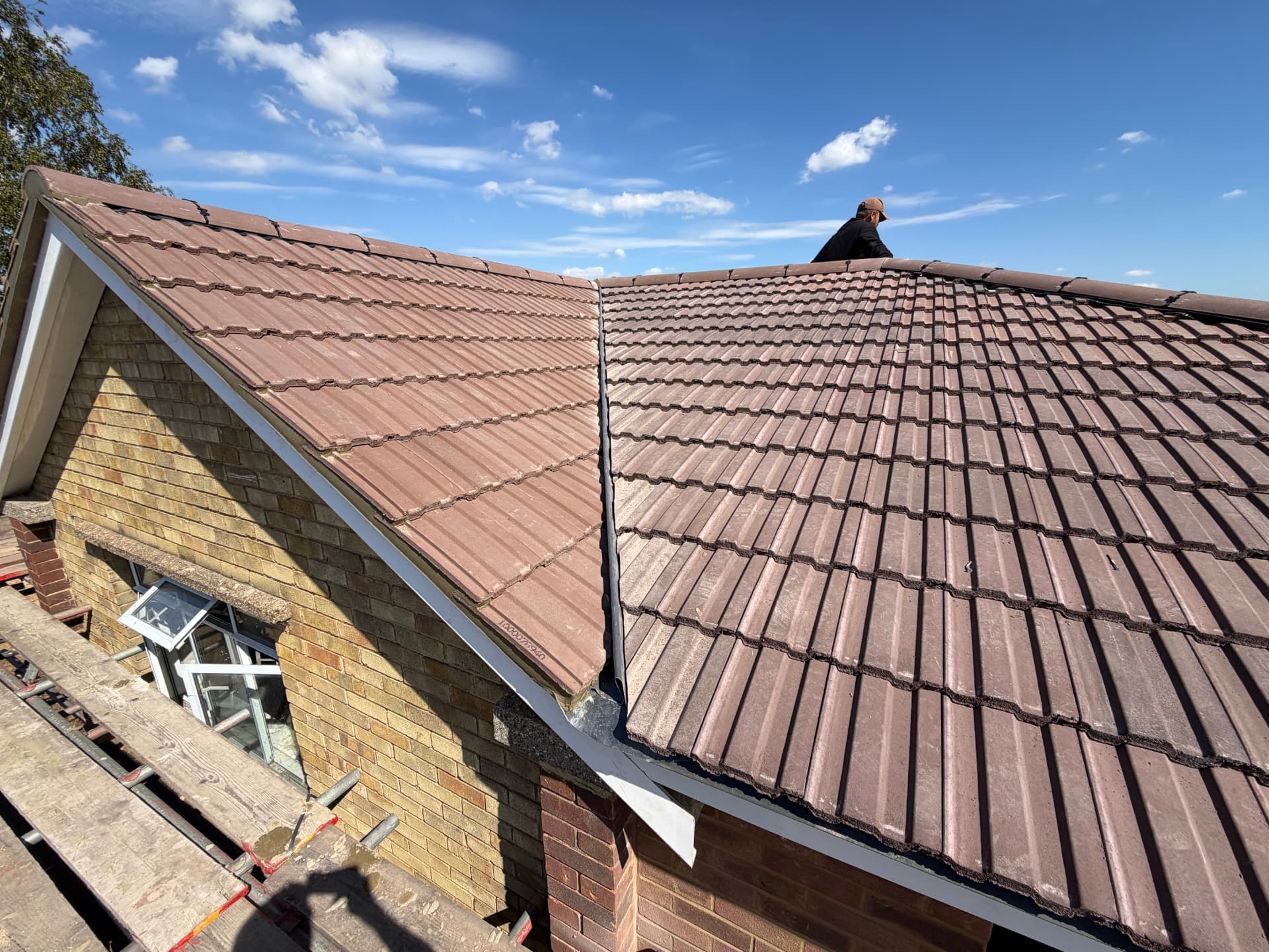 Side view of the finished roof showing the dry valley and gable detail