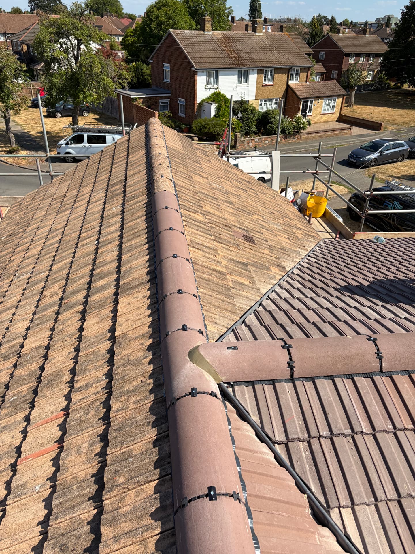 Junction where the new tiled roof meets the original, with lead valley